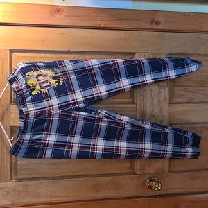 Gryffindor plaid pajama pants from Harry Potter collection line.